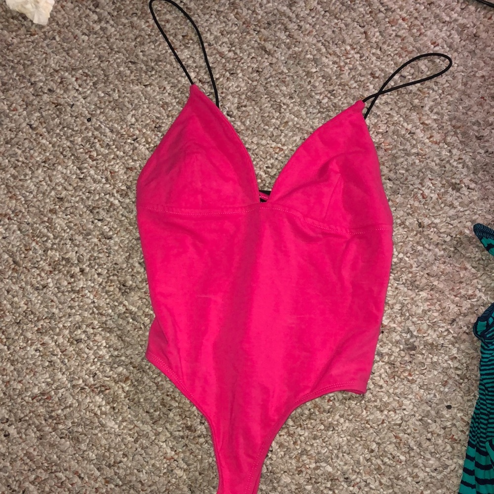 Hot pink body suit